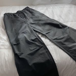 Gray drawstring parachute pants